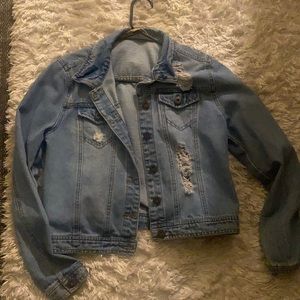 I'm selling a Jean jacket it's Size medium been worn 3 times at most.